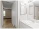 Classic bathroom featuring a vanity, a wall mirror and overhead lighting at 5525 E Thomas Rd # R11, Phoenix, AZ 85018