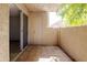 Outdoor patio featuring tiled flooring and sliding glass doors providing access to indoor living spaces at 5525 E Thomas Rd # R11, Phoenix, AZ 85018