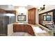 Bathroom with double sink vanity, elegant lighting, and glass shower at 5879 E Marconi Ave, Scottsdale, AZ 85254
