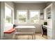 Bright dining area with natural light, built-in bench seating, and a dedicated workspace at 6311 E Calle Rosa --, Scottsdale, AZ 85251