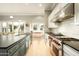 Gourmet kitchen featuring professional-grade appliances, sleek countertops, and ample cabinet space at 6311 E Calle Rosa --, Scottsdale, AZ 85251