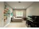 Inviting living room with natural light, soft carpet, and a piano at 6311 E Calle Rosa --, Scottsdale, AZ 85251