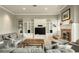 Spacious living room with custom built-ins, fireplace, and comfortable seating at 6311 E Calle Rosa --, Scottsdale, AZ 85251