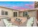 Enchanting backyard patio featuring a stylish outdoor seating area and sliding glass doors, perfect for indoor-outdoor living at 717 E Palmaire Ave, Phoenix, AZ 85020