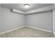 Spacious basement featuring neutral paint, modern lighting, and wood-look flooring for a versatile living space at 717 E Palmaire Ave, Phoenix, AZ 85020