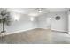 Bright living room with ceiling fan and sliding glass door to patio at 717 E Palmaire Ave, Phoenix, AZ 85020