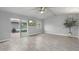 Bright living room with sliding glass door access to backyard patio at 717 E Palmaire Ave, Phoenix, AZ 85020
