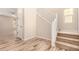 Bright entryway with tile floors, staircase, and a view into another room at 734 W Winchester Dr, Chandler, AZ 85286