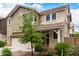 Inviting home with well-manicured landscaping, mature trees, and vibrant flowering bushes create a picturesque setting at 734 W Winchester Dr, Chandler, AZ 85286