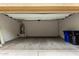 Spacious two-car garage featuring a water heater and room for storage at 734 W Winchester Dr, Chandler, AZ 85286