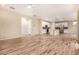 Open-concept living space with tile floors seamlessly connects the living and kitchen areas, great for entertaining at 734 W Winchester Dr, Chandler, AZ 85286