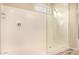Modern shower with glass door, window, and updated fixtures at 734 W Winchester Dr, Chandler, AZ 85286