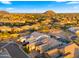 Real estate aerial view showcasing neighborhood homes at 8149 E Jaeger St, Mesa, AZ 85207