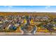 A bird's eye shot presents the community's streetscape and desert landscaping with a distant mountain view at 8149 E Jaeger St, Mesa, AZ 85207