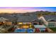 Aerial view of a backyard oasis featuring a pool, spa, pergola, and covered patio at 8149 E Jaeger St, Mesa, AZ 85207