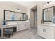 Spacious bathroom with dual vanities, ample storage, and modern fixtures throughout at 8149 E Jaeger St, Mesa, AZ 85207