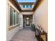 Charming home entrance with stone accents, brick walkway, and manicured landscaping at 8149 E Jaeger St, Mesa, AZ 85207