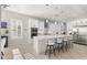 Modern kitchen with large island, stainless steel appliances, and ample counter space at 8149 E Jaeger St, Mesa, AZ 85207