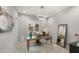 Bright office with a wooden desk, modern lighting, and a neutral color palette at 8149 E Jaeger St, Mesa, AZ 85207