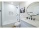 Bathroom features white subway tile and black fixtures, with shower and tub combination at 832 S Drew St, Mesa, AZ 85210