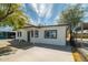 The exterior shows a charming single-story home with modern updates and a spacious concrete area at 832 S Drew St, Mesa, AZ 85210