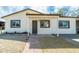 Charming home featuring stucco exterior, covered entry, and well-maintained landscaping at 832 S Drew St, Mesa, AZ 85210