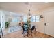 Bright living room with a dining area, laminate flooring, recessed lights and natural light at 832 S Drew St, Mesa, AZ 85210
