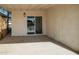 Covered patio with sliding glass door, offering a relaxing outdoor space at 832 S Drew St, Mesa, AZ 85210