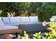 Outdoor fire pit area with seating and landscaping at 8734 E Amelia Ave, Scottsdale, AZ 85251