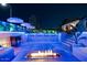 Entertain in style with this poolside bar, lounge seating, and fire pit, perfect for evening gatherings at 8734 E Amelia Ave, Scottsdale, AZ 85251
