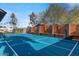 Backyard sports court with basketball hoop and net offers fun outdoor activities at 8734 E Amelia Ave, Scottsdale, AZ 85251