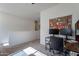 Spacious home office featuring modern desk setup with natural light and comfortable seating at 10035 E Trent Ave, Mesa, AZ 85212
