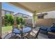 Inviting covered patio with stylish outdoor furniture, perfect for relaxing or entertaining guests at 10035 E Trent Ave, Mesa, AZ 85212
