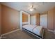 Bedroom featuring a murphy bed and neutral walls at 10371 W Pontiac Dr, Peoria, AZ 85382