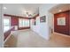 Bright and airy kitchen with stylish countertops, white cabinetry, and views of the backyard at 10371 W Pontiac Dr, Peoria, AZ 85382
