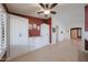 Open-concept living area with built-in storage and display cabinets, offering ample space for Gathering and entertaining at 10371 W Pontiac Dr, Peoria, AZ 85382