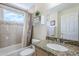 Stylish bathroom with a vanity, tub, shower, and elegant tile work at 10401 N 52Nd St # 205, Paradise Valley, AZ 85253