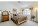 Charming bedroom with decorative furniture, a large window, and soft natural lighting at 10401 N 52Nd St # 205, Paradise Valley, AZ 85253