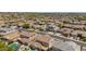 This aerial view showcases a well-planned community, desert landscaping, and varied home styles at 10741 W Paso Trl, Peoria, AZ 85383