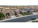 Beautiful home showcasing a well-kept lawn, landscaped yard, and a peaceful residential street at 10741 W Paso Trl, Peoria, AZ 85383