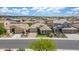 Attractive home featuring manicured landscaping, a well-maintained lawn, and a charming neighborhood setting at 10741 W Paso Trl, Peoria, AZ 85383