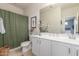 Clean bathroom featuring a white vanity, and shower with curtain at 10741 W Paso Trl, Peoria, AZ 85383