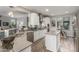 A view of this kitchen featuring stainless steel appliances, an island, and wooden floors at 10741 W Paso Trl, Peoria, AZ 85383