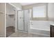 Bathroom featuring a shower, tub, closet and tile floors at 10743 W Bronco Trl, Peoria, AZ 85383