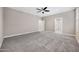 Bedroom featuring carpet flooring, neutral paint, and ceiling fan at 10743 W Bronco Trl, Peoria, AZ 85383