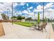Community bocce ball court with seating, perfect for outdoor recreation and leisure at 111 S Greenfield Rd # 119, Mesa, AZ 85206