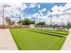 Bocce ball court with nearby seating, perfect for gatherings at 111 S Greenfield Rd # 119, Mesa, AZ 85206