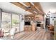 Eat in kitchen with ceiling fan, wood cabinets and sliding glass doors at 111 S Greenfield Rd # 119, Mesa, AZ 85206