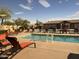 Beautiful community pool with plenty of seating at 11342 E Laguna Azul Cir, Mesa, AZ 85209