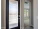This entryway offers an inviting view of the spacious interior, including a view of the bright windows at 11656 W Luxton Ln, Avondale, AZ 85323